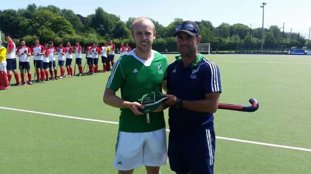 Banbridge Hockey Club captain Eugene Magee was presented with his 200th Irish cap by national Head Coach Ned Fulton on Sunday. Eugene becomes the first Ulsterman to reach the landmark figure but says he would trade it for a place in the Olympics.