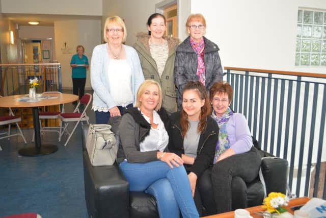 Linda Wilson, Jenny Drake, Hazell Masey and Julia and Ally Trutwein with Phyllis McFaul at the Holy Trinity Church coffee morning. INCT 21-067-GR