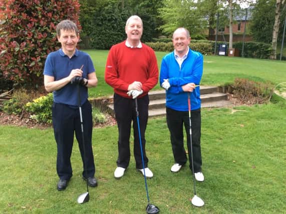 George Redpath, Andy Sproule and Colin Fleming at the 14th hole during the Craig Fleming Trophy at Dunmurry Golf Club on Saturday.