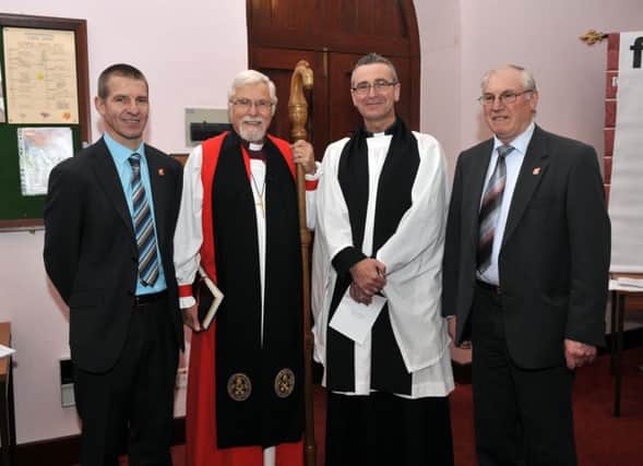 The Right Reverend Harold Miller, Bishop of Down and Dromore with Rev Alan Kilpatrick at his installation as rector of Knocknamuckley Parish Church. INLM46-107gc