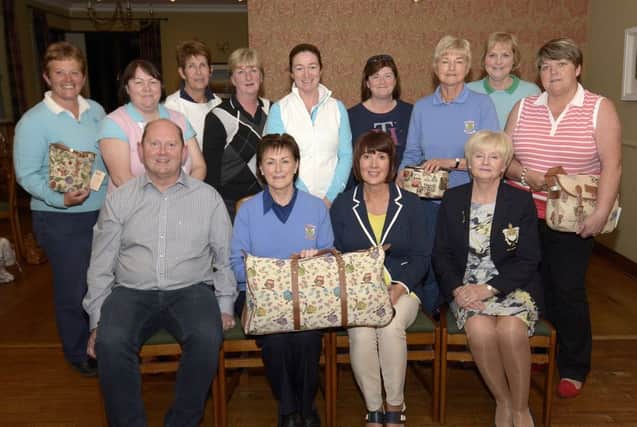 Lady Captain Lorna Poots pictured with Porters Open Sponsors William and Audrey Porter winner Yvonne Galloway, runner up Jane Doyle and section prizewinners Gail McNabb, Denice McBrien, Rosemary Dodds, Sharon Allen, Diana Whan, Rene Norris, Kathryn Sawyers and Denise Nelson. INBL1522-206EB