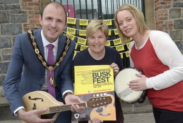 Lord Mayor Darryn Causby, Events Officer Leah Duncan and Assistant Events Officer Danielle Fegan tune up for the 2015 Busk Fest in Banbridge on 27th June ©Edward Byrne Photography 1522-203EB