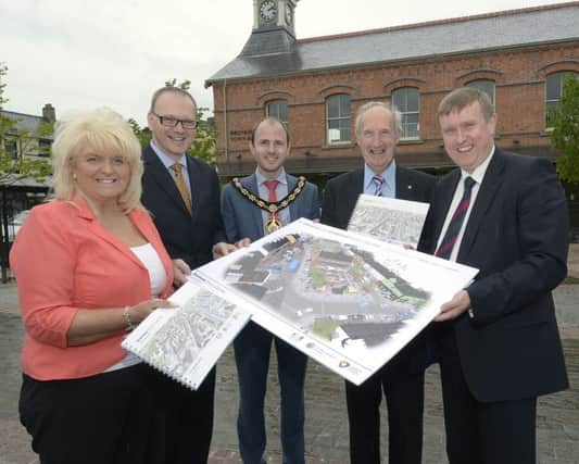 Pictured at the launch of the Dromore Master Plan are from left Cllr Carol Black, Armagh City, Banbridge and Craigavon Chief Executive Roger Wilson, Lord Mayor Darryl Causby, Alderman Arnold Hatch and Minister for Social Development Mervyn Storey MLA. INBL1522-209EB
