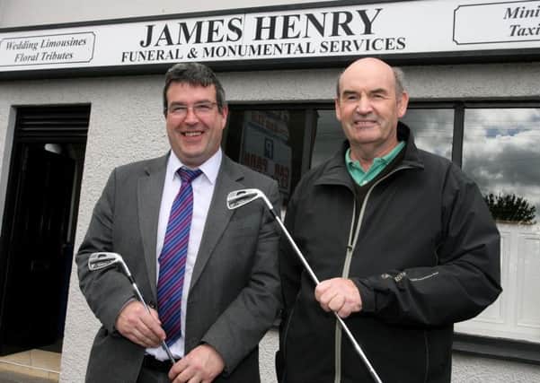 James Henry, of James Henry Funeral and Monumental Services, sponsor of the James Henry Services competition at Ballymena Golf Club, is pictured with club official Ken Revie. INBT22-200AC