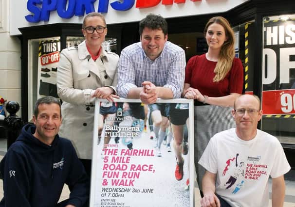 Grainne Devin of the Fairhill Centre is pictured with Mark Montgomery (Montgomerys, sponsor), Grace Carmichael (Ballymena Town Centre Development) and Ballymena Runners James Turtle and Noel Connor, promoting the Fairhill 5 mile Road Race on June 3. INBT23-229AC