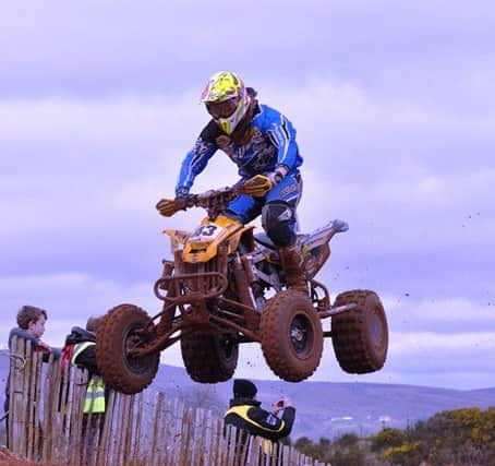 Lisburn's Dean Colhoun sits in third place as he seeks to challenge for the Ulster Quadcross Championship.
