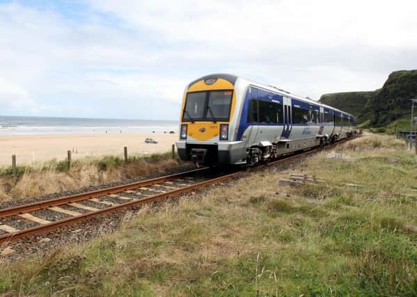The Londonderry to Coleraine train passing Downhill, in Co Londonderry. Photo: Paul Faith/PA Wire