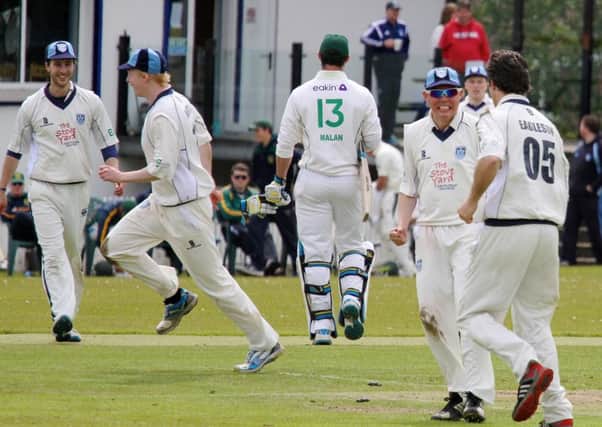 Carrickfergus Cricket Club's players celebrate after North Down's overseas player Pieter Malan is stumped by wicketkeeper Gordon Browne. INLT 23-950-CON Photo: CricketEurope / Ian Johnston
