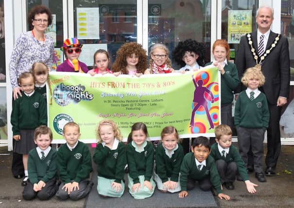 Children from St Aloysius Primary School, along with principal Catherine Milne and Mayor Thomas Beckett, getting ready for their Boogie Nights fundraiser, on June 27, to help buy new playground equipment. US1522-570cd  Picture: Cliff Donaldson
