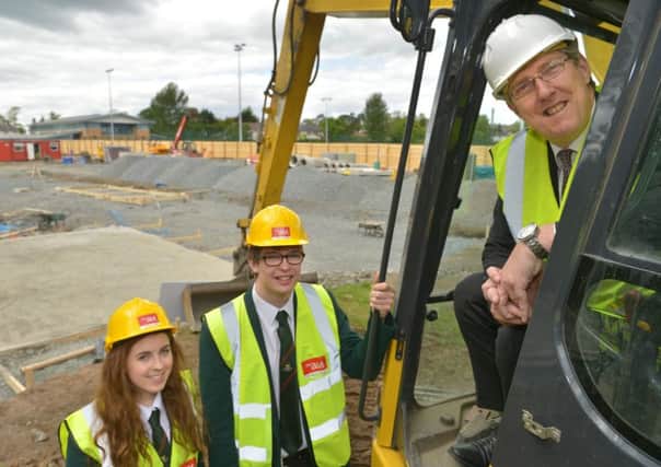 Education Minister John O'Dowd meets Head Boy and Girl Gareth Hill and Emma Rutter, from Friends' School, Lisburn,  as a £3.3million construction project begins at their school.
Photo by Aaron McCracken/Harrisons