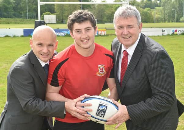 Limavady RFC player Daniel Irvine, pictured with Sean Murphy (left) and Stephen Cruise (right) from Ulster Bank, reminds local rugby clubs to register for Ulster Bank RugbyForce.