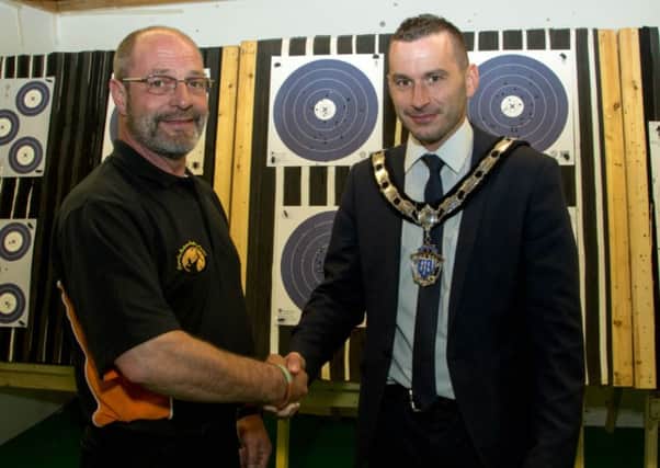 Mid and East Antrim Borough Council deputy mayor, Timothy Gaston (right) with Robin Brown, Head Coach at County Antrim Archery Centre which was recently appointed as the resident archery provider for Carnfunnock Country Park. Have A Go archery opportunities will be available from 11.00am to 5.30pm at weekends until September. INLT 23-941-CON
