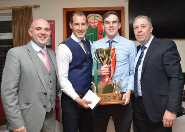 (l-r) Johnny Hastings (LTOB manager), Gary Haveron (Carrick Rangers first-team coach) Matt Devine, Larne Tech Player of the Year and Paul Hardy. INLT 23-908-CON
