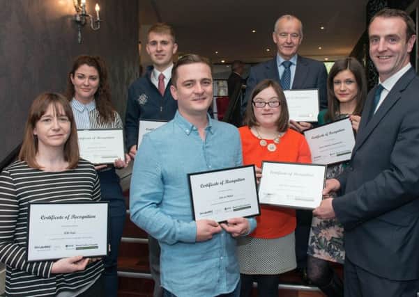 Environment Minister Mark H. Durkan pictured during a presentation ceremony after he awarded Certificates of Recognition to groups who received Road Safety Grants in a DOE programme administered by the Community Transport Association. Included from left are Christine OKane, U3A Foyle, Grace Girvan, Beam Creative Network, Dean Steele, NI CRUISE, Conall McCorry, Féile an Phobail, Aoife Burke, Foyle Down Syndrome Trust, Michael Hasson, GAA, Ulster Council President and Louise Hughes, Greater Shantallow Community Arts.