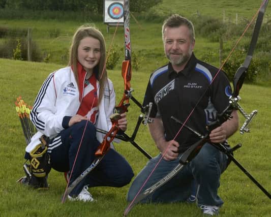 Aimee Convery and her father Alan preparing for this week's World Archery Youth Championships. INBL1523-203EB
