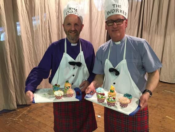 'Bishop of Connor, the Rt. Rev. Alan Abernethy and the -Stephen McBride, (Archdeacon of Connor) compete in a charity bake-off at St. Patrick's Church, Ballymena - INBT-24F-BAKE OFF. (Submitted picture)