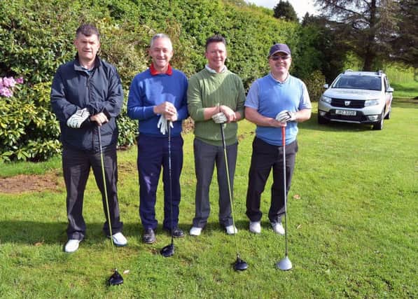 Michael Smyth, Michael Scroggie, Eddie Gilmore and Martin Agnew ready to tee off in the Donnelly & Taggart competition at Ballymena Golf Club. INBT 23-901H