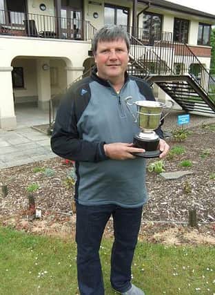 Paddy Malcolmson with the Centenary Cup, which he won by five shots.