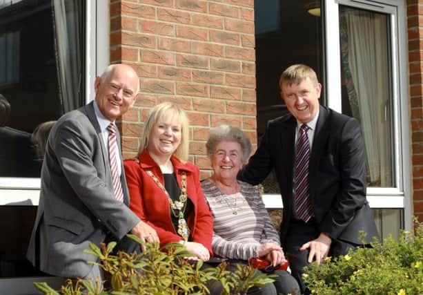 Mervyn Storey MLA, has attended an open day at Shiels Court, with (L-R), Timothy Quin, OakleeTrinity, Mayor, Councillor Michelle Knight-McQuillan and tenant Agnes ONeill. INBM24-15 S
