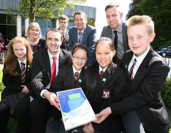 Ulidia Integrated College took second place in the Eco-Committee of the Year Post Primary Award at the SSE Airtricity and Eco-Schools Global Wind Awards. Pictured, from left, are: Laura Duffin, teacher Sandra Patterson, Minister for the Environment Mark H Durkan, Ethan Hall, Ian Humphreys, CEO, Keep Northern Ireland Beautiful, Leanne Ku, Kyna Ku, Josh Bradley, Communications nanager, SSE Airtricity and David Johnston. INCT 23-790-CON