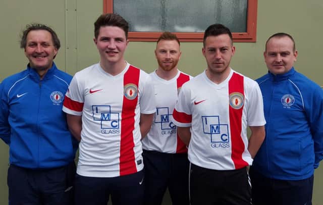 Coach Geordie McCallister (left) and manager Richard McMinn (right) welcome new signings Colin Cunningham, Neil Clydesdale and Jeff Brady to Banbridge Rangers.
