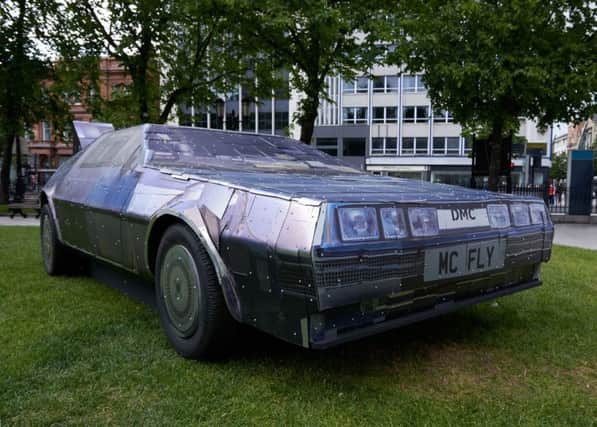 The unveiling of the Belfast Photo Festival's DeLorean Print Project.