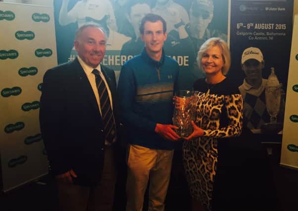 2015 North of Ireland Amateur Strokeplay winner Tiarnan McLarnon (Massereene GC) with Valerie Penney (Specsavers Ballymena) and Galgorm Castle Golf Club Captain Keith Dinsmore.