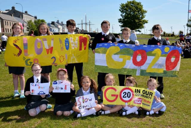 Pupils from Victoria Primary School backing the Brake campaign for drivers to slow to 20 mph near schools. INCT 24-001-GR