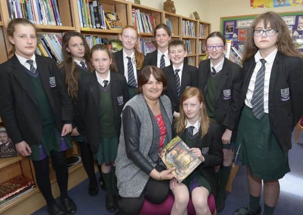 New-Bridge Integrated College Year 8 Student Amy White pictured with Librarian Jacqueline and members of New-Bridge College Book Club. Edward By
