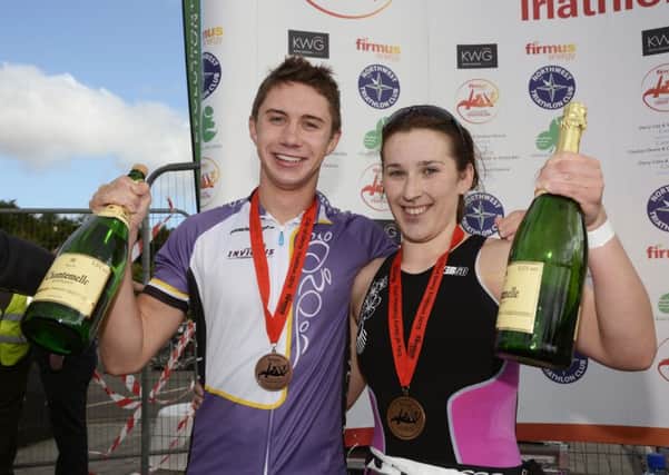 Race winners Harry Speers and Siobhan Gallagher celebrate. INLS2415-178KM