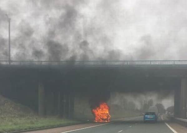 This was the dramatic moment a Limavady man's car caught fire on the M2, 20 minutes after he bought it. Picture - North East News
