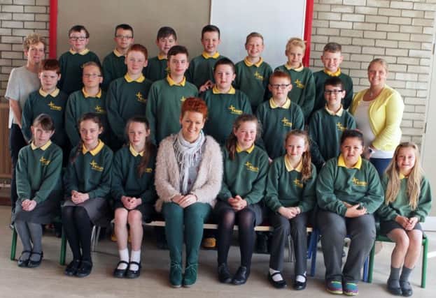 THREE TIERS. St Brigid's PS pupils with Mrs Campbell, C/A Miss Anderson and VP Mrs McNally.INBM22-15 005SC.