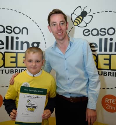 Press Release Image

 NO FEE

Friday 12th June 2015
Pictured at the Ulster Final of the Eason Spelling Bee which took place yesterday, Thursday 11th June 2015, is Curtis Caulfield from Antrim. Curtis won first place in the Provincial Final and will go on to represent the province at the All Ireland Final in RT Studios on Friday 19th June. He will go up against the three other provincial winners for the title of 2015 Eason Spelling Bee All-Ireland Champion live on RT 2fm's Tubridy Show.