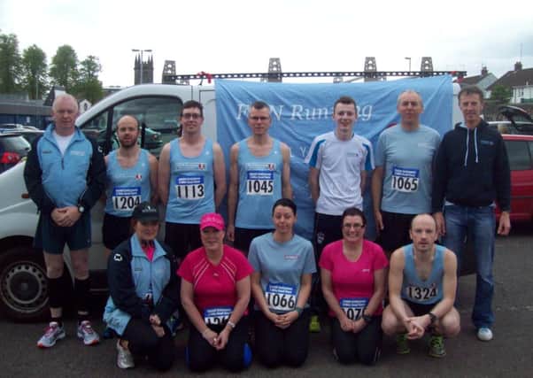 Fit N Running athletes with coach Gregory Walsh at the Fairhill 5mile road race.