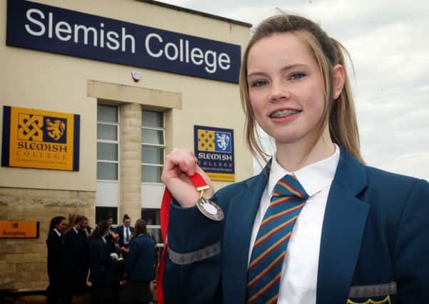 Slemish College year 10 pupil Lauren Roy, winner of the 100 metres at the All Ireland championships, is traveling to Manchester in September to compete in the UK School games. INBT25-232AC