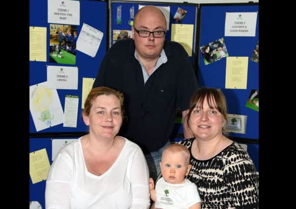 Pictured at Acorn are Graham and Adele OBeirne with baby Adam and instructor Emma Middleton.  INCT 23-726-CON