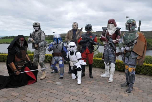 The Star Wars characters strike a pose for the Mail camera.INMM2415-388