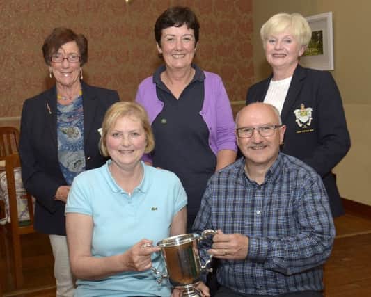 Kathryn Sawyers received the Challenge Cup from Sponsor Sherwin Curran (Active Pest Management), included is Section Winner Ada Lavery, Lady President Glennis Smyth and Lady Captain Lorna Poots ©Edward Byrne Photography INBL1524-236EB