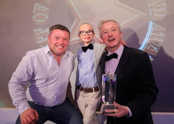 Overall Spirit of NI Winner Jay Beatty from Lurgan pictured with Louise Walsh and Specsavers Craigavon Store Director Jamie Stevenson.