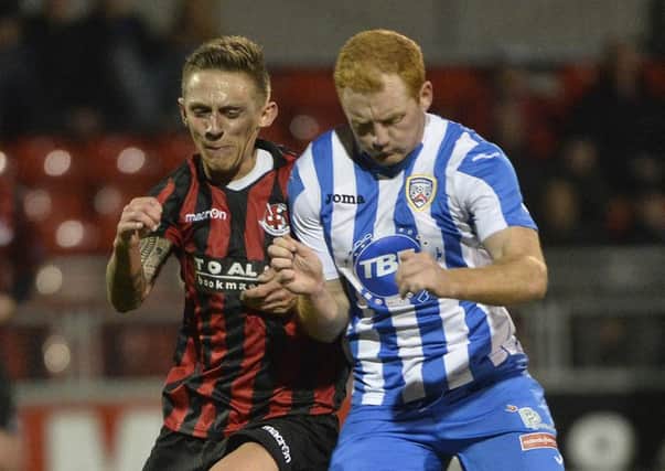 Joe McNeill (right), seen here in action for Coleraine against Crusaders, has signed for Carrick Rangers. Photo: Presseye