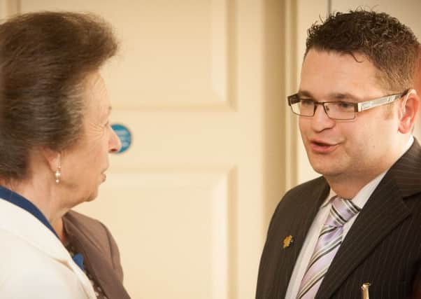 Whiteabbey Hearing Link volunteer James Newell meets HRH Princess Royal at the Tower of London. INNT-25-703-con