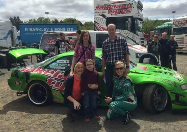 Ethan McClean centre with mum Yvette, sister Amy and dad Andrew with 'drifting' star Danielle Murphy at the Car Fest.