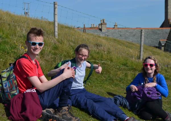 Year 11 pupil Noah Barnley and year 8 girls Leah Dowds and Lucy McKaig take part in the College ramble.  INCT 24-720-CON