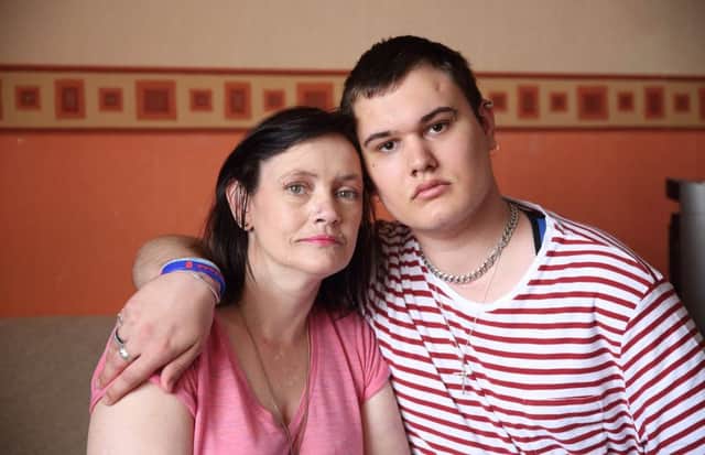 Helen-Louise Vineer and her son Scott Vineer, who was beaten up and left for dead while walking home from college in 2012. US1524-548cd  Picture: Cliff Donaldson