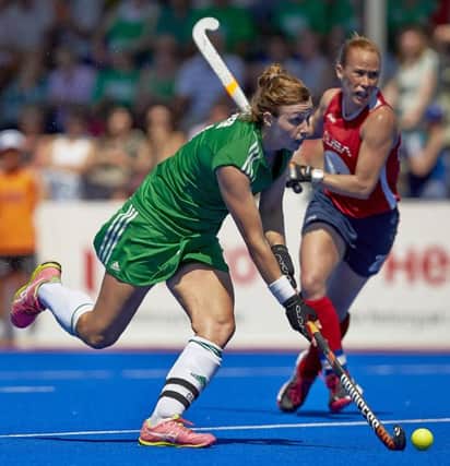 Ireland's Megan Frazer makes a break before setting up Anna OFlanagan to score Ireland's second goal.