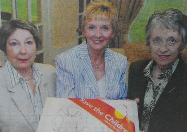 Carol Laird, chairperson of the Cookstown Branch of Save the Children with founder members Claire Acheson and Rosemary Shearer when the branch celebrated its 40th anniversary at a special dinner held at Killymoon Golf Club.