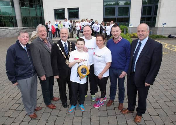 Mayor Thomas Beckett, along with Cllrs Paul Porter, Pat Catney and James Tinsley joined walkers getting ready to take off on a 13-mile walk to help raise funds for Defibs for Kids. US1522-501cd  Picture: Cliff Donaldson