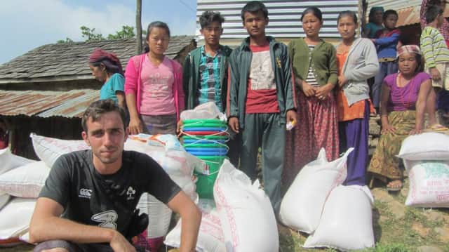 Andrew Bovill with local people who received aid from his team who travelled out to remote villages hit by the Nepal earthquake.  INBT-26F- ANDREW BOVILL 1.