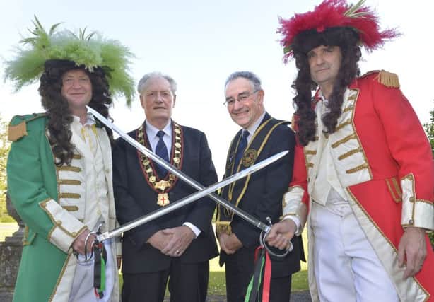 l-r: King James (Brian Johnston), Millar Farr, Sovereign Grand Master of the Royal Black Institution, Billy Scott, Grand Registrar of the Royal Black Institution, and King William (John Adair) at the launch on the 2015 Sham Fight. Pic by Rowland White