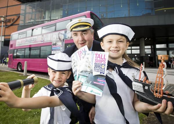 Up to 500,000 visitors like little Olly and Lucy McKay pictured with Translink bus driver Hugh Thompson are expected at The Tall Ships Races 2015 and Translink has announced special transport arrangements for everyone heading to the spectacular maritime event in Belfasts dockland, July 2  5.